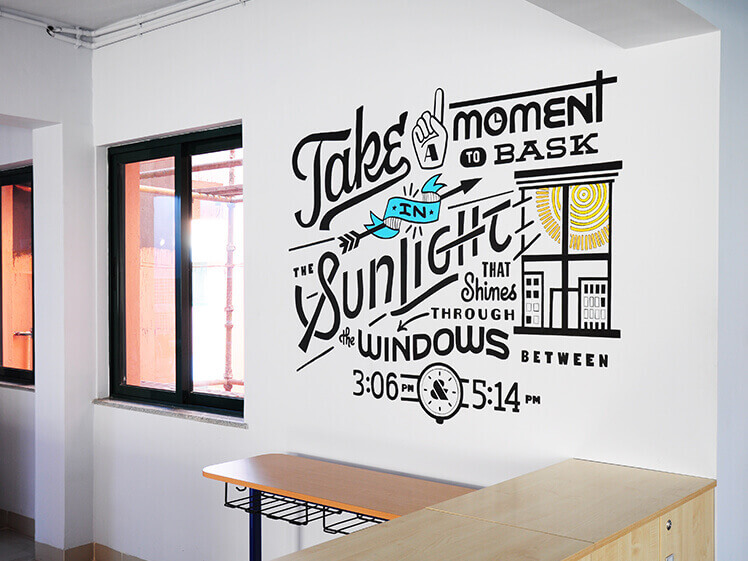 Typography mural art in office bt Decotarium